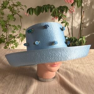 Stylish Light Blue Satin Ribbon Hat with Blue Floral Accents